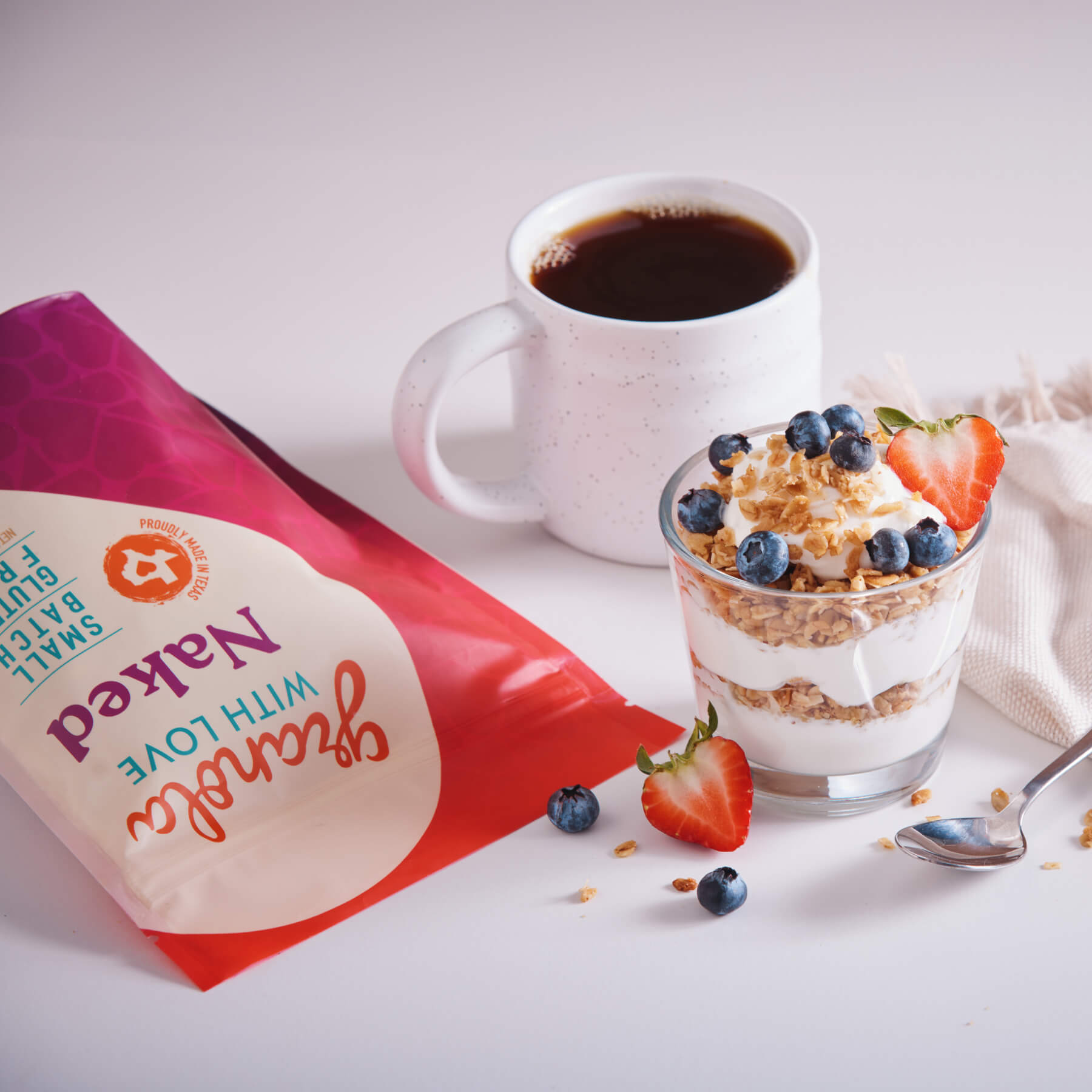 Healthy naked granola yogurt parfait with berries breakfast Dallas